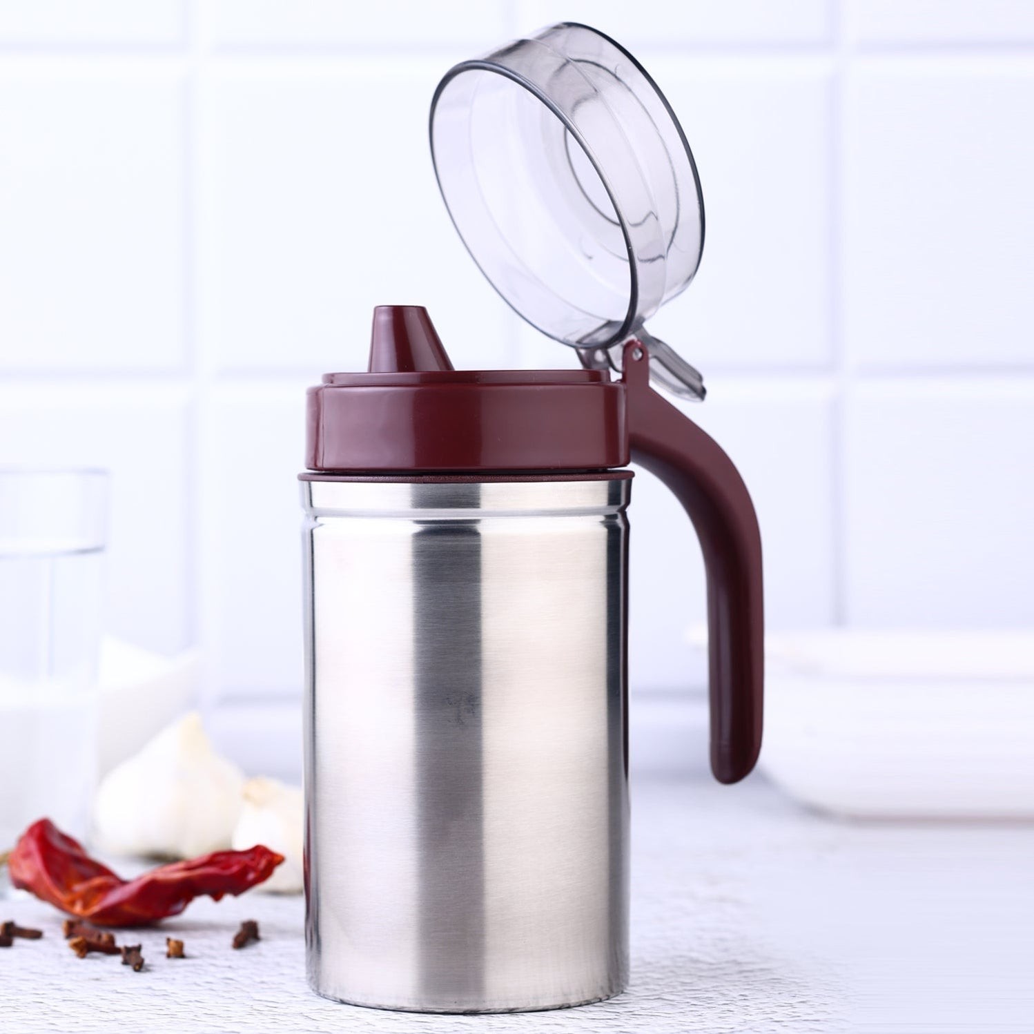 Oil Dispenser Stainless Steel with small nozzle 500ML Oil Container. by ganesh